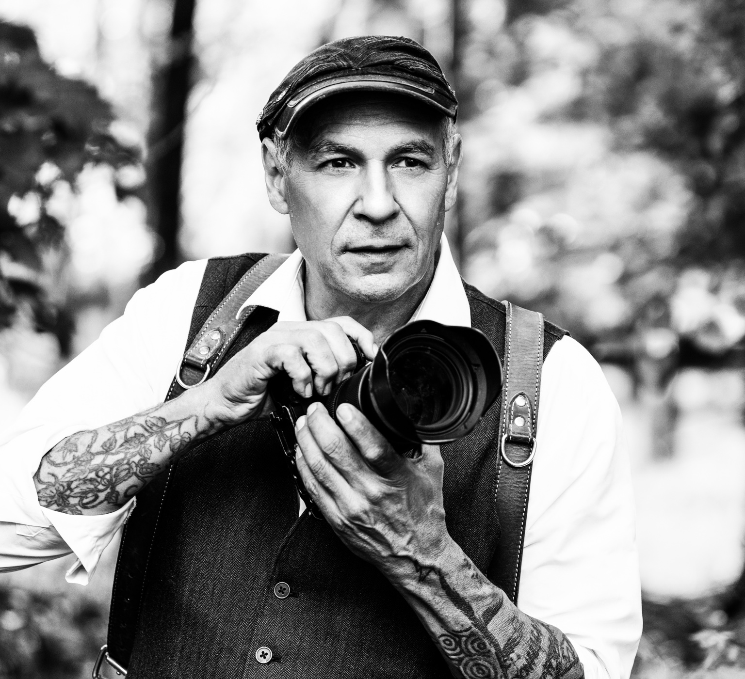 Doug Sanford holding a camera