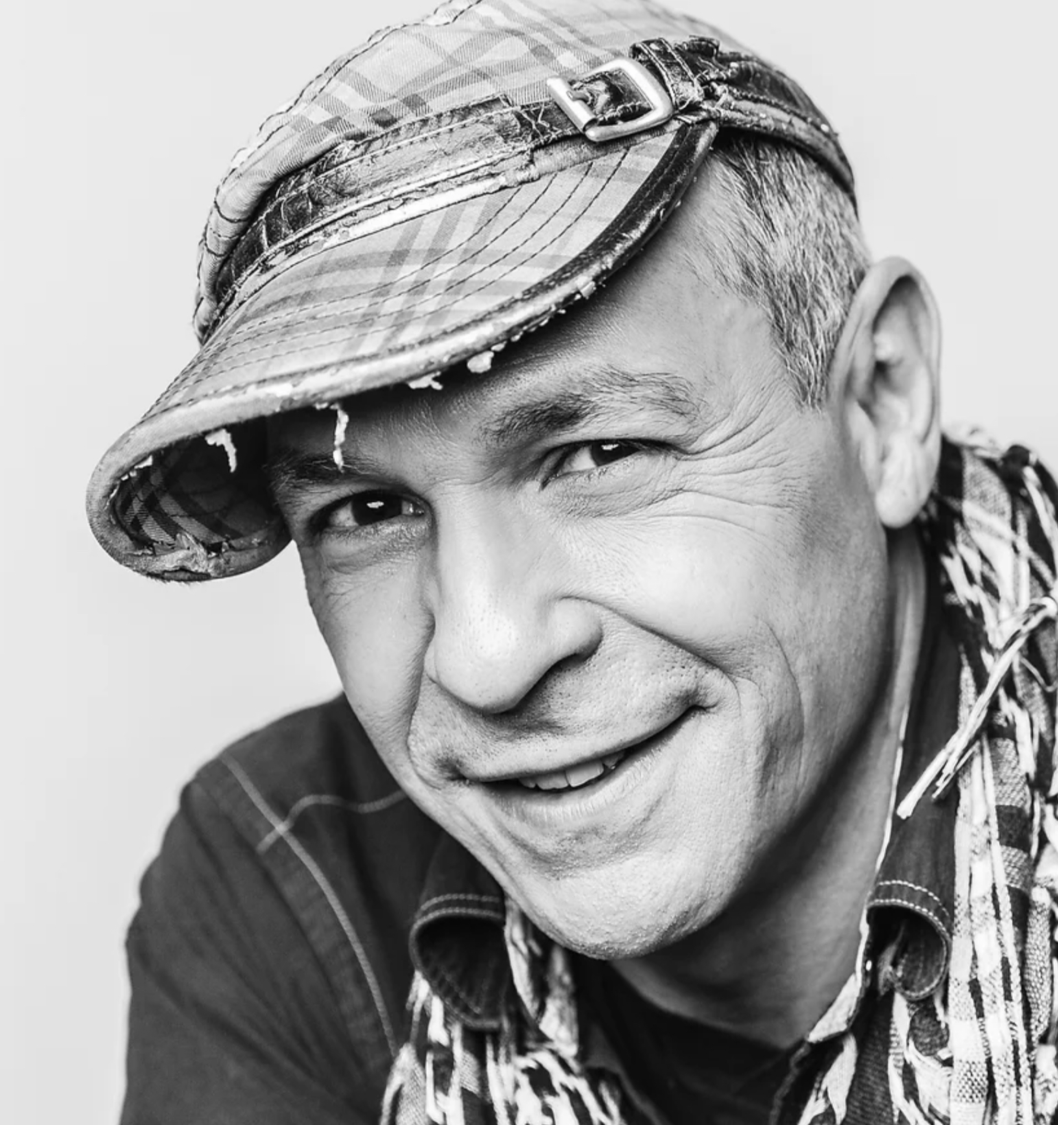 Black-and-white portrait of Doug Sanford smiling